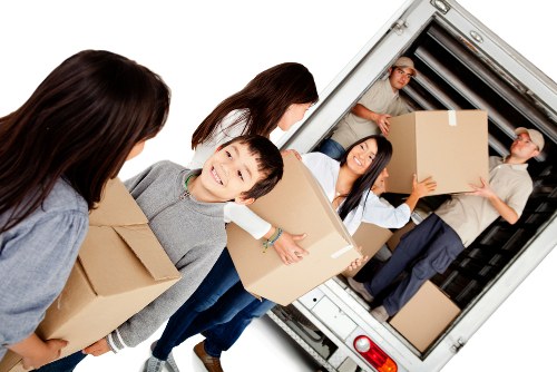 Loading household furniture for a flat removal in Earlsfield