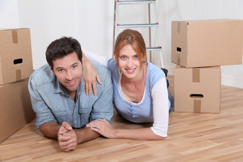 Packed boxes and labeled containers for home storage