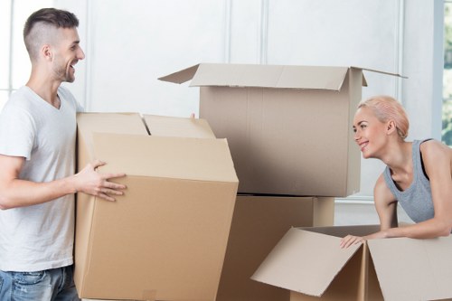 Packed storage unit in Earlsfield with labeled boxes and furniture